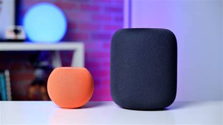 HomePod mini and Memoji A HomePod mini surrounded by memoji