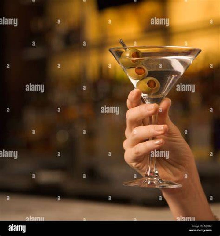 A martini with three olives