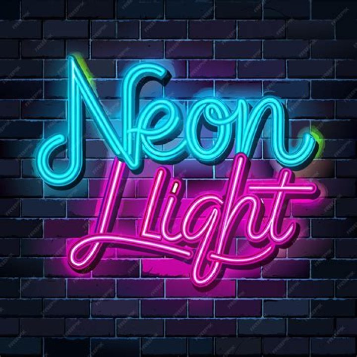 A neon sign that says "play"