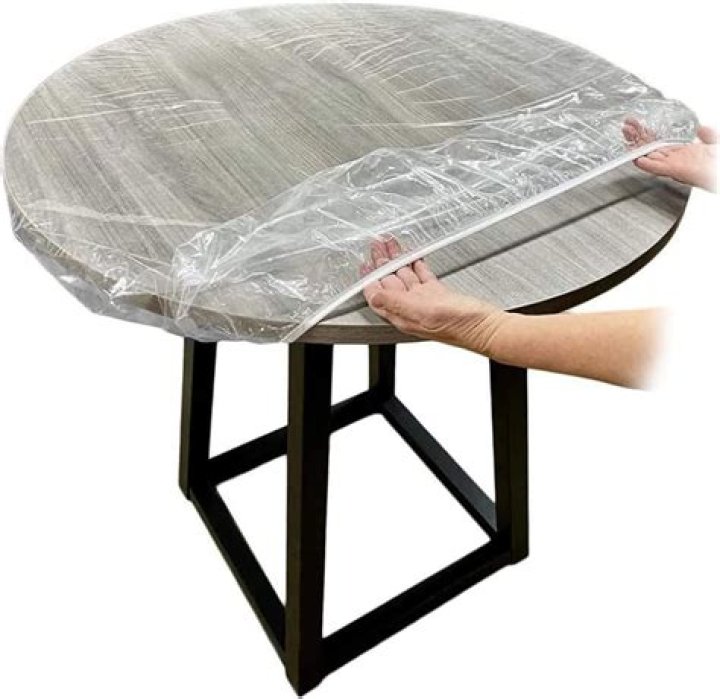 A table covered with cards and alcohol