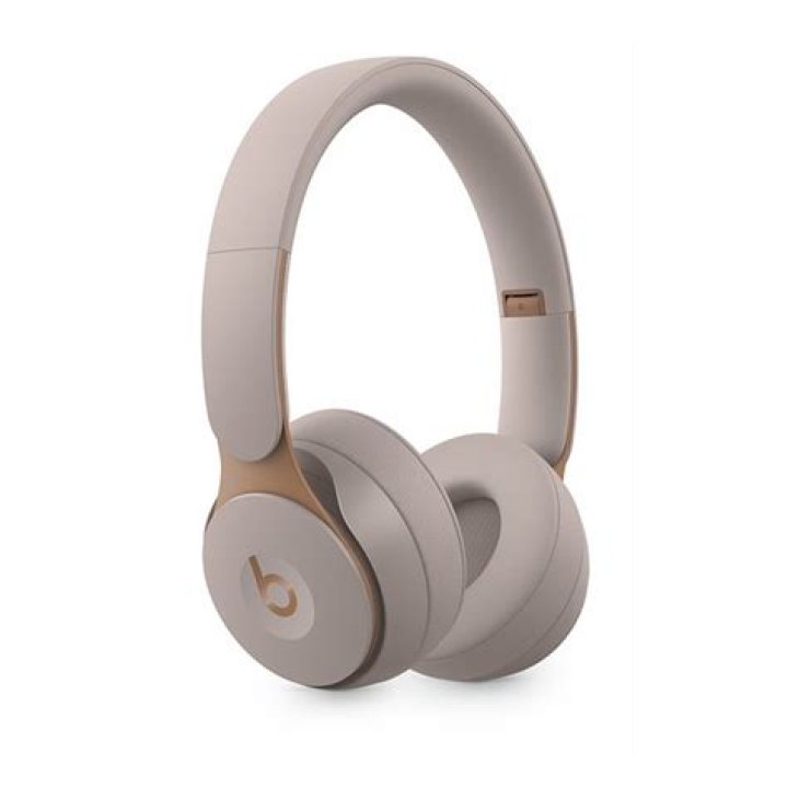 Beats Solo Pro noise cancelling headphones woman touch controls gesture