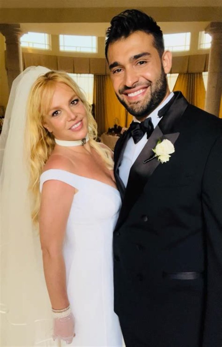 Britney Spears and Sam Asghari pose for photos
