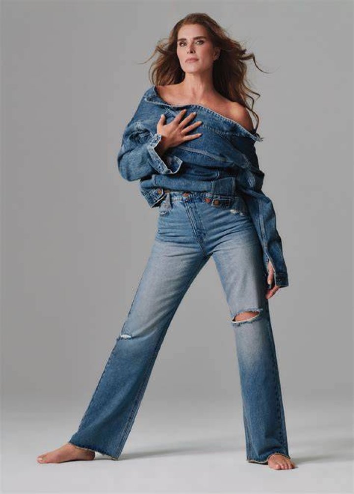 Brooke Shields posing topless in jeans