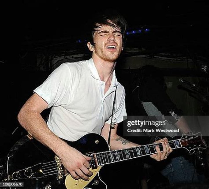 Drake Bell performs on stage