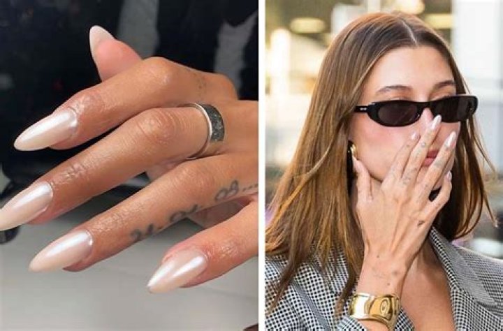 Hailey Bieber showing her nails on Instagram