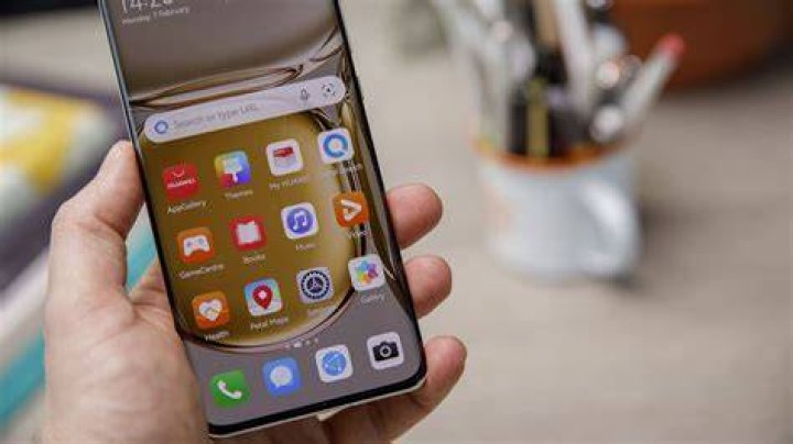 Huawei P50 Pro home screen in hand 2