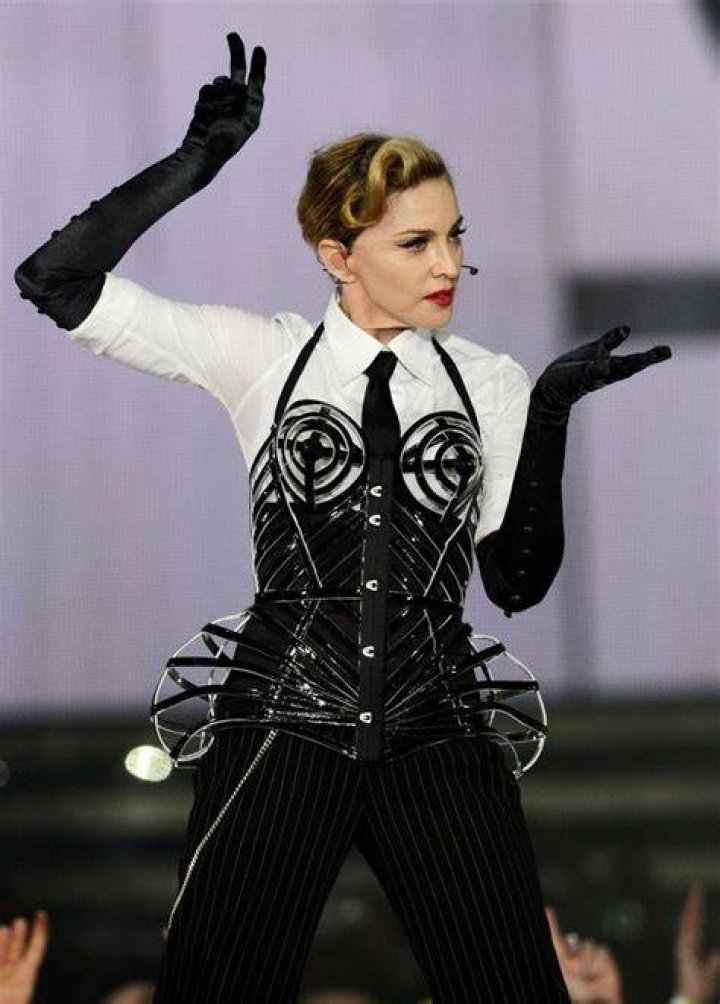 Madonna wearing a black bra and underwear