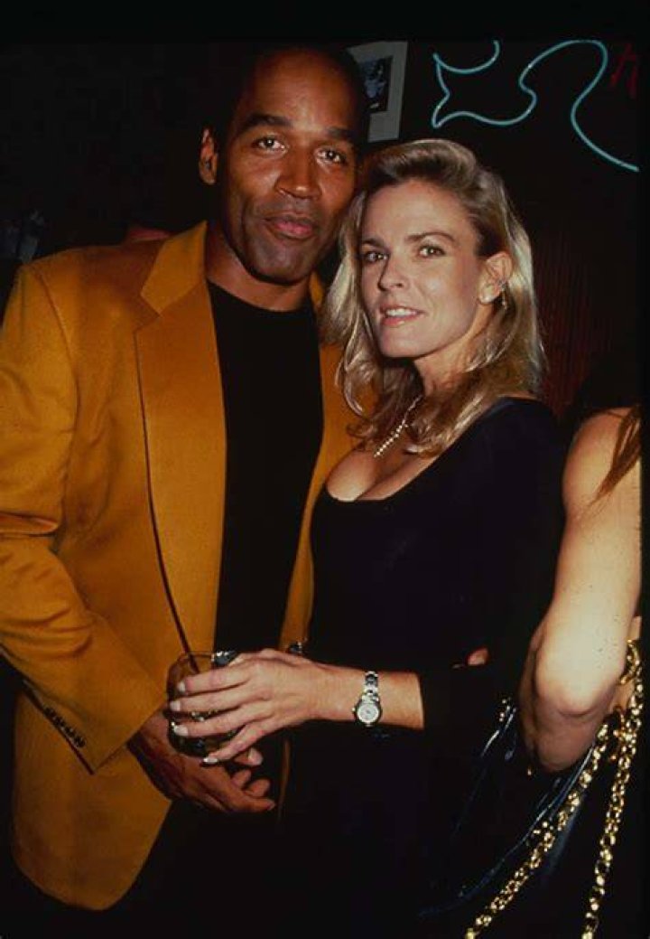 OJ. Simpson and Nicole Brown Simpson standing together