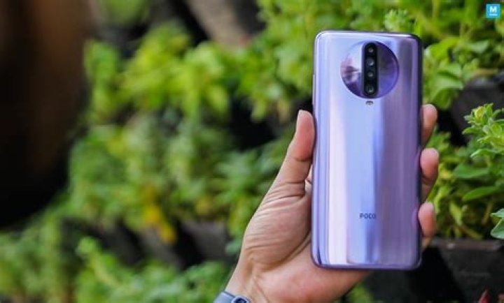 Poco X2 in hand showing back