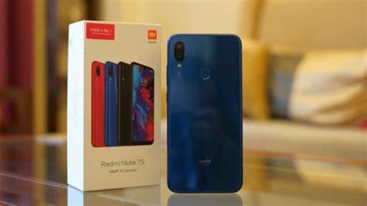 Redmi Note 7S showing back and box packaging Redmi Note 7S showing back and box packaging