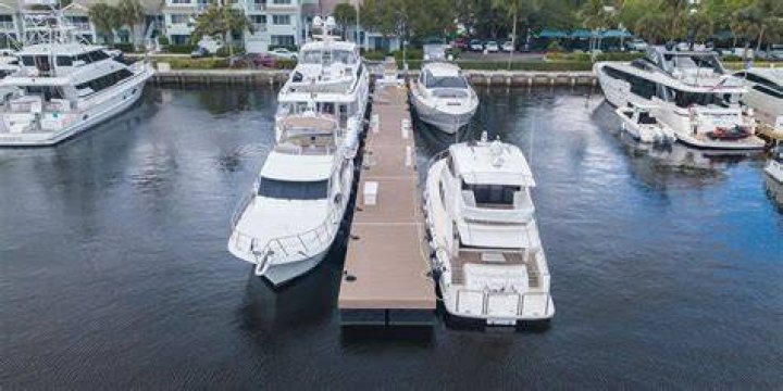 Several yachts at a dock